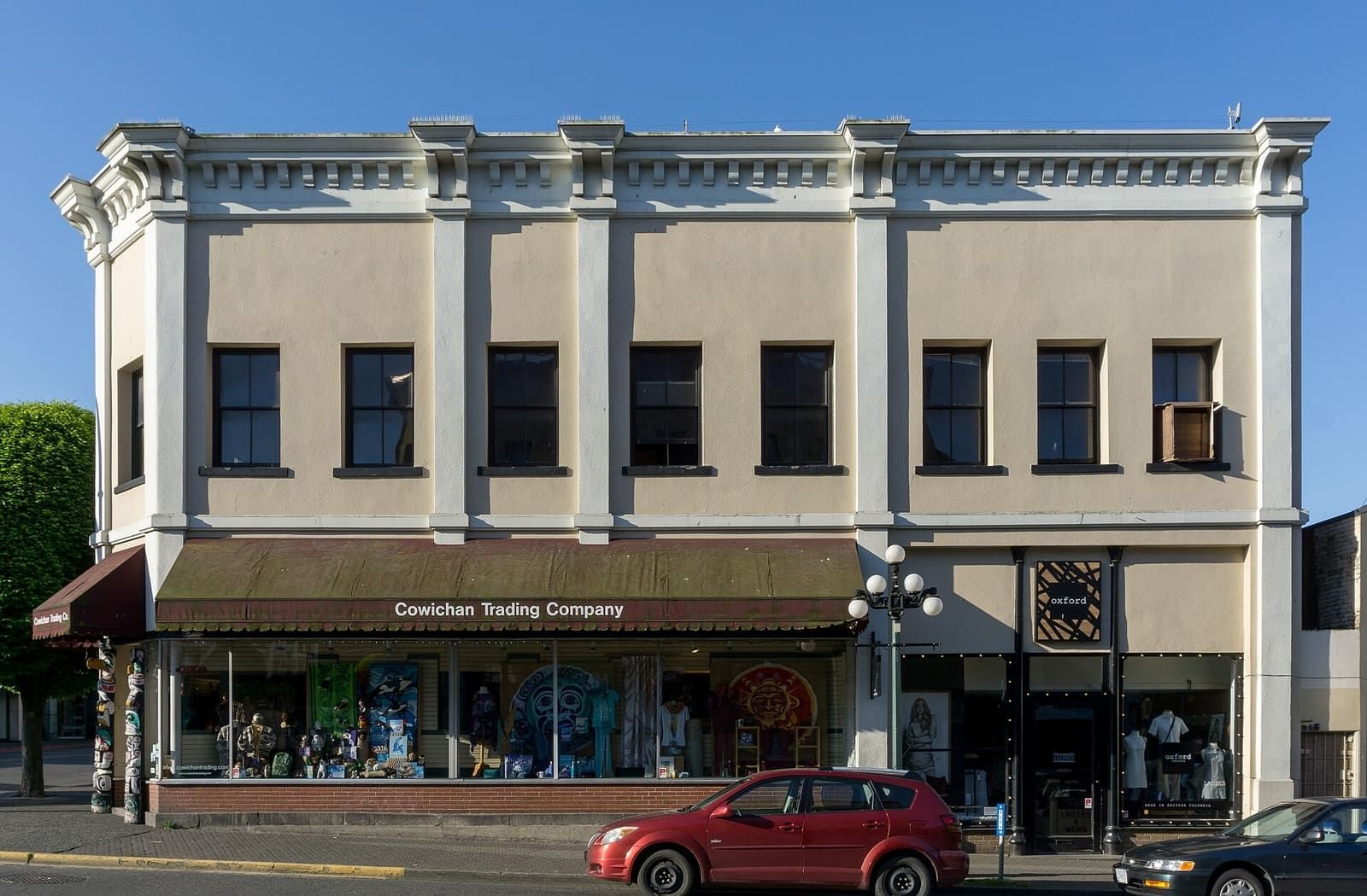 A two-storey heritage building with a shop at street level on Government Street, Victoria